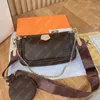 Varm högkvalitativ lyxdesigners tjej handväska mode crossbody plånbok purses lyxiga barn axel tote hobo_bags präglad väska