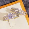 バンドリングHuitan Tren Hollow Set Rings Full Bling Iced Out CZ Stone Luxury Women Wedding Engagement Rings 2PCS Set Jewelry Drop Shipping L240305