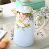 Tazas Tetera de porcelana europea de hueso 1000 ml Juego de té de la tarde en inglés Cafetera de porcelana de alta calidad Hervidor resistente al calor