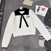 Designer Miu Home Tidig Autumn New Letter Brodery Hand Hook Doll Neck Hollow Out Long Sleeve Sticked Cardigan For Women Phk2