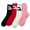 Chaussettes rayées avec lettres spéciales pour femmes, chaussettes respirantes en coton avec lettres pour cadeau de fête, 4 couleurs