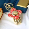 Key Rings With box Luxury key chain designer sun flower key chain letter diamond designer key chain womens jewelry key ring bag pendant couple pendant car key good gift