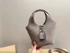 Designer bag hand sewn custom new women's bag lock buckle lychee pattern vegetable basket bag bucket bag capacity handbag