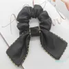 Bijoux de mode pour femmes design en cuir noir agneaux peau belles filles coiffure porte bijoux cheveux