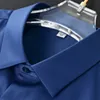 6XL Abito formale grande di alta qualità Autunno e inverno Uomo manica lunga Camicia bianca pura Non stirare Business Casual Seta di ghiaccio 230226