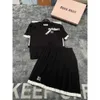 Mi24 early spring new girl style diamond grid short sleeved top+pleated half skirt knitted set01