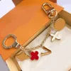 Fashion Key Holder Keychain Car Luxurys Designers Keychain Car Key Fashion Flower Keyring Bag Charm Lovers Gift 2211103Z310O