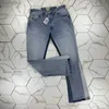 Męskie dżinsy HM572 Męskie dżinsy czarne spodnie Designer Projektowanie Naklejki Ściganie Lekkie Przerwanie Rock Rocka True Religions Strażne sprężyste spodnie dżins 240305
