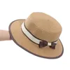 Wide Brim Hats Bucket Hats New Summer Womens Rowing Beach Hat Wide Silk Womens Casual Panama Hat Womens Classic Flat Bow Knot Straw Hat J240305