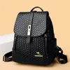 Factory outlet ladies shoulder bag large-capacity anti-theft buckle student backpack flip vertical fashion woven handbag outdoor travel black leisure backpack 018#