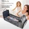 Torby na pieluchy 1pc Nowe przenośne składane łóżko mamusa wyjdź światło na dużą pojemność wielofunkcyjną Mother and Baby Bag Plecak Mommy łóżko BAGL240305