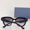 Nieuwe mode-design cat eye-zonnebril 1134 klassiek gevormd acetaatframe, eenvoudige en populaire stijl, veelzijdige UV400-beschermingsbril voor buiten