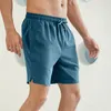 Hardloopshorts heren lente en zomer effen kleur platte voorkant voor heren trainen bulk heren atletisch strand