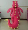 costumi mascotte di dinosauro rosa caldo realizzati da professionisti con ali da indossare per adulti