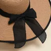Wide Brim Hats Bucket Hats New Summer Womens Rowing Beach Hat Womens Casual Panama Hat Womens Classic Flat Bow Knot Straw Hat Womens Gift J240305