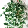 Dekorativa blommor konstgjorda murgröna girland lämnar falska hängande växter grönska lövsimulering vinstockar släpande bröllopsfest heminredning