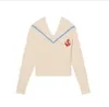 -San * dro 2024 early spring new loose V-neck color matching pullover knitted sweater for women