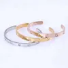 Bracciale di coppia di gioielli d'amore di design di lusso Bracciale da donna a forma di C Bracciale d'amore con vite C Lettera Bracciale per amanti in acciaio inossidabile 316LS