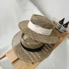 Chapeaux larges chapeaux seau chapeaux 2021 nouveau chapeau de paille à la main femmes chapeau d'été panama chapeau mode rond haut plat protection solaire chapeau de soleil en gros J0305