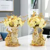 Disposizione di vasi in oro in ceramica in stile europeo Tavolo da pranzo Accessori per la decorazione della casa Vasi creativi con cigno dorato 240228