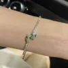 Neues grünes Augen-Schlangenlicht-Luxus-Armband, einfach und exquisit, einzigartig und elegant, hochmodisch, verstellbares Armband für Frauen