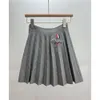 TB Academy Style Puppy veckad stickad A-Line Kort för kvinnors avslappnade och mångsidiga höga midja enhetlig kjol