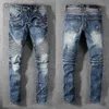 Jeans voor heren Denim nieuwste herenontwerper Jean Distressed Ripped Biker Slim Fit Motorcycle Bikers voor herenmode Mans zwarte broek 240305