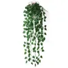 Dekorativa blommor konstgjorda murgröna girland lämnar falska hängande växter grönska lövsimulering vinstockar släpande bröllopsfest heminredning