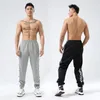 Calças esportivas masculinas correndo com bolsos treinamento de futebol jogging esportes fitness leggings de futebol ao ar livre sweatpants 240228