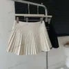 Summer 2 Colors Womens Skirt Metal Letter High Waist Pleated Skirt Anti-Gare Thin Mini Skirts Women