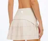 2024デザイナーLu Lemons Women Sport Yoga Skirts Roning Shorts Solid Color Pleated Tennis Golf Skirt Anti Exindy Fiess Short 6 Lu-Lu 005