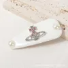 Designer Vivienewestwoods Hair Clip Empress Dowager Xis BB Clip är klar söt och söt Saturn hårklipp läder huvudstycke hår tillbehör handgjorda diamant inlagd si