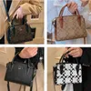 Designer coas Andrea CarryAll Handväska Tygväska kvinnor ess cc axel crossbody väskor Koppling plånbok hobo purses damer c-formade läder messenger satchels totes