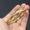 Hot tiffay armband knoop nieuw product kale V goud fashion design geavanceerde persoonlijkheid vlinder touw gewikkeld NY31