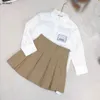 Luxury kids dress Two piece suits high quality child tracksuits Size 100-160 CM White long sleeved lapel shirt and Pleated skirt 24Mar