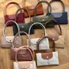 2024 Mode féminine Grand sac fourre-tout Marque Designer Sacs à main Shopping écologique Sac à bandoulière Simple Casual Dumpling Sac sous les bras Sac