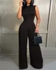 Casual ärmlös blommig tryck Jumpsuit Kvinna vårens sommarlånga breda ben Jumpsuits för kvinnor Black Rompers 240219