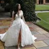 Fantastici abiti da sposa arabi in tulle di pizzo Dubai Una linea maniche lunghe Collo trasparente Appliques Perline Abiti da sposa lunghi con spacco sul davanti Robe de mariage personalizzate BC18324_