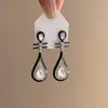 Pendientes colgantes Vintage con diamantes de imitación para mujer, gota de laúd chino negro, encanto creativo, accesorios étnicos estéticos de moda