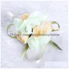 装飾的な花の花輪新しい結婚式の手首の花50pcs/set花嫁介添人姉妹