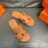 Chinelos de designer de alta versão dos homens chinelos moda praia sapatos para o verão wear respirável e casual flip flop sandálias cn4u