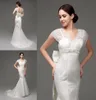 2015 Mermaid Lace Wedding Dresses in Stock Cap Sleeves Backless Bridal Bridal With Big Bow Vneck Designer Wedding Dress2857772