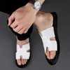 Designerskie kapcie Summer Mens Top Warstwa Skórzane oddychane buty na zewnątrz Sandały One Line Sandal