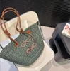 Borsa di paglia con cestino di design Borse per la spesa alla moda Borse da spiaggia Borsa da spiaggia aperta a tracolla intrecciata a mano di design Borsa estiva da donna di alta qualità