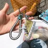 2024 Nieuwe creatieve sprankelende canvas schoenen sleutelhanger mini gekleurde kleine schoenen autotassen hangende accessoires modetrend accessoires fabriek groothandel en voorraad