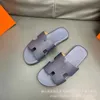 Chinelos de designer de alta versão dos homens chinelos moda praia sapatos para o verão wear respirável e casual flip flop sandálias cn4u