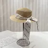 11 estilo designer balde chapéu chapéu de palha mulheres casquette aba larga chapéus casuais grama trança chapéus senhora viagem praia bonés marca de luxo chapéu superior plano