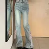 Klein ontwerp met riemen en mini-broeken Retro jeans met hoge taille voor vrouwelijke Xia Pittige meisjes Slanke rechte Bell-broek Herfst 240229