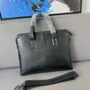 Topphylla Cowhide Luxurys Designers Väskor Portfölj Män Business Package Hots Sale Laptop Computer Bag Läder Handväska Messenger Hög kapacitet axelhandväskor