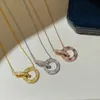 Joyería de diseño Collar de amor de oro y diamantes Colgante circular Clásico de lujo para mujer Cadena larga Titanio Plata Oro Pated con caja